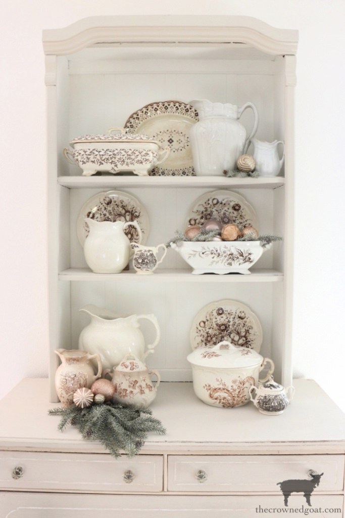Champagne Wishes Holiday Home Tour: Champagne and Blush Christmas Ornaments in Breakfast Nook Hutch-The Crowned Goat 