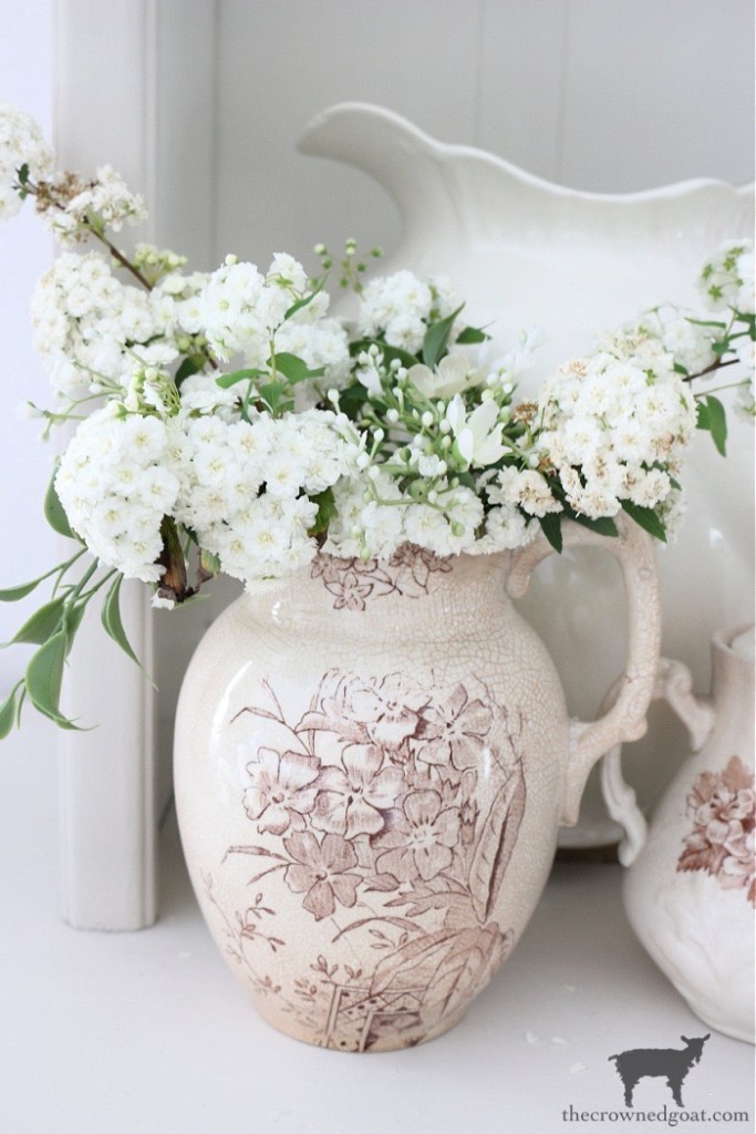 How to Style a Small Hutch - Antique Brown and White Transferware Pitcher Filled with Flowers - The Crowned Goat