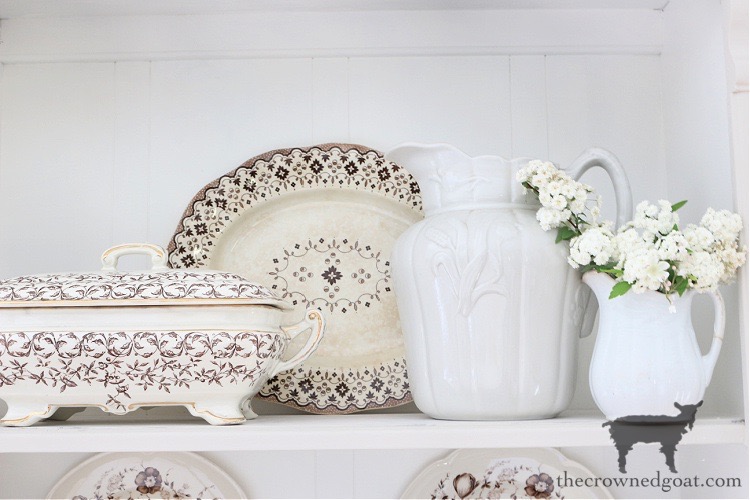How to Style a Small Hutch - Brown and White Transferware and Ironstone Pitchers with Flowers - The Crowned Goat