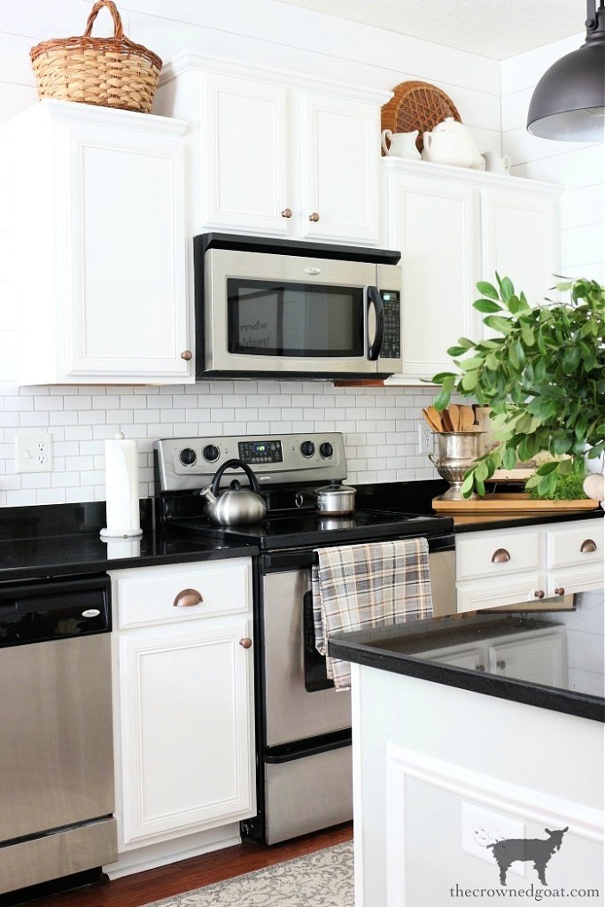 Tips and Tricks for Decorating the Tops of Kitchen Cabinets-The Crowned Goat 